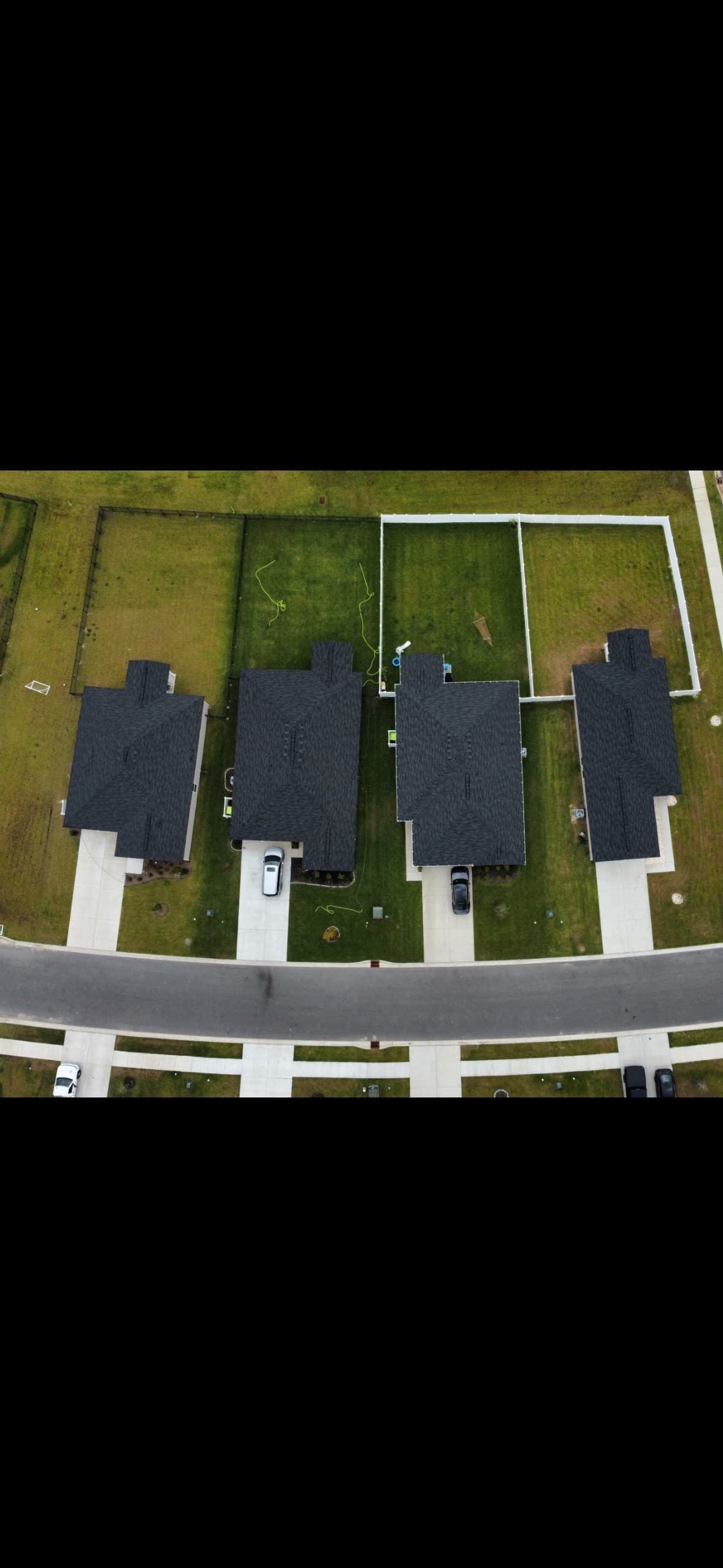 Aerial view showing the two middle lawns we service